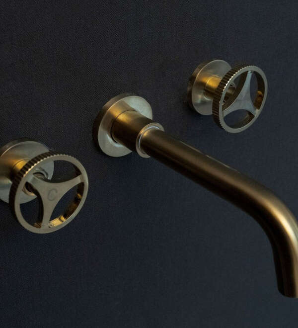 Unlacquered Brass Wall Mounted Faucet With Round Handles